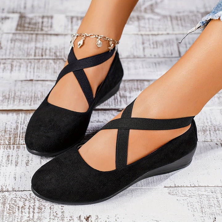 Versatile women's flat wedge sandals in a neutral tone, ideal for office wear, casual chic, or elegant summer outfits.