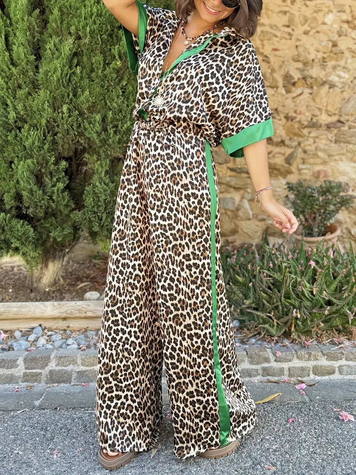 Comfortable women's wide-leg trousers and collared top two-piece set. Flowy spring/summer fashion.