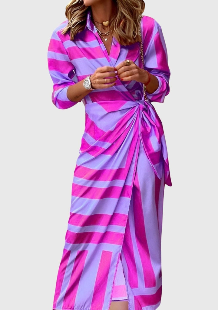 Flowing women's elegant printed V-neck wrap dress, perfect for summer fashion & flattering silhouette.