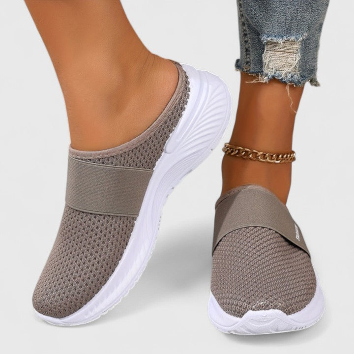 Supportive ladies' sneakers for foot pain relief & orthopaedic comfort.