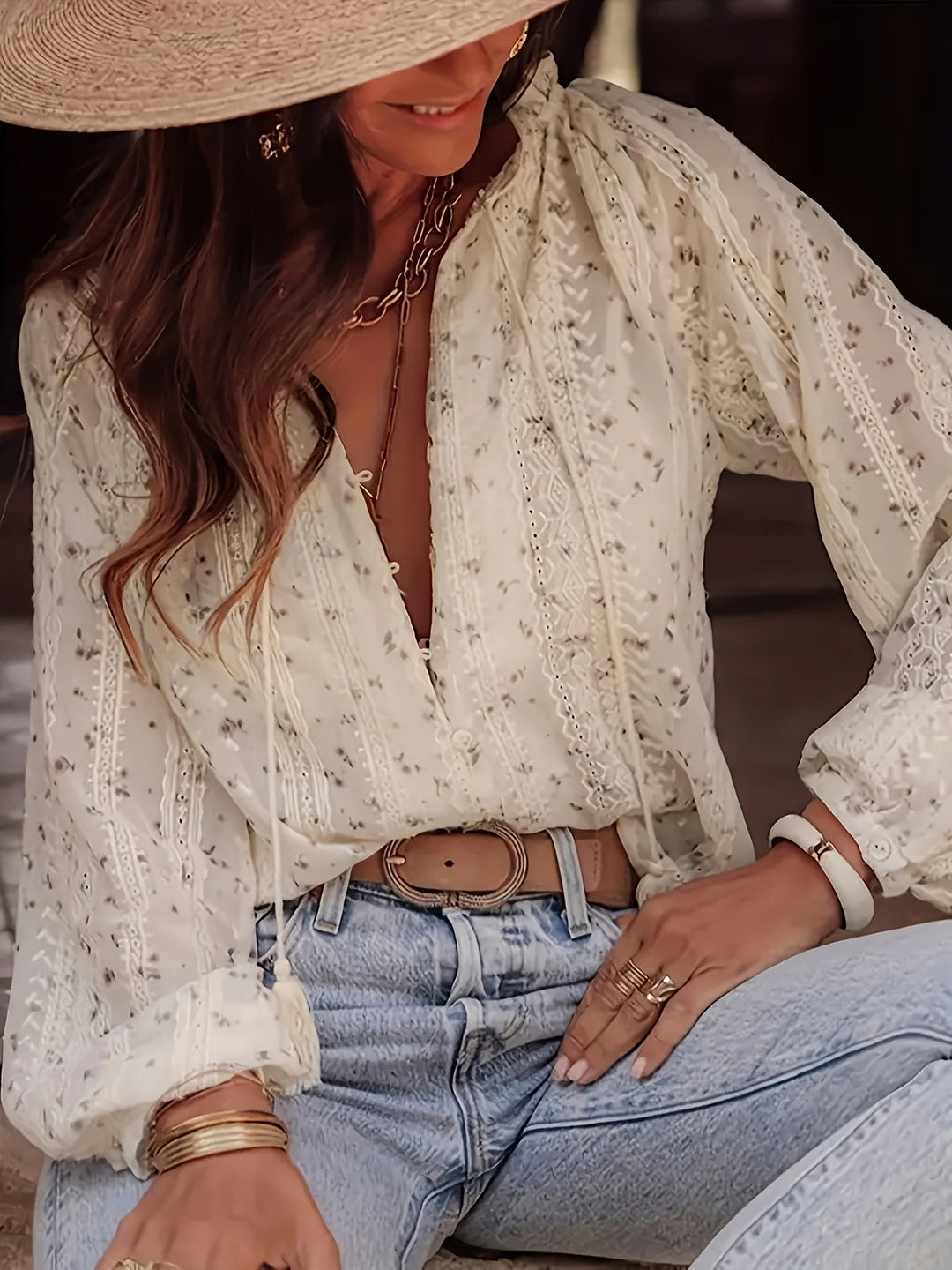 Women's elegant floral V-neck blouse, perfect for spring/summer, offering a sophisticated & versatile look.