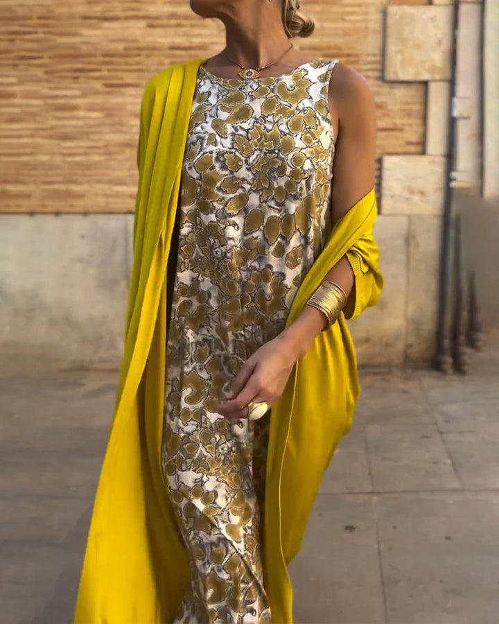 Women's elegant maxi dress and matching cardigan, ideal for evening wear, summer or special occasions.