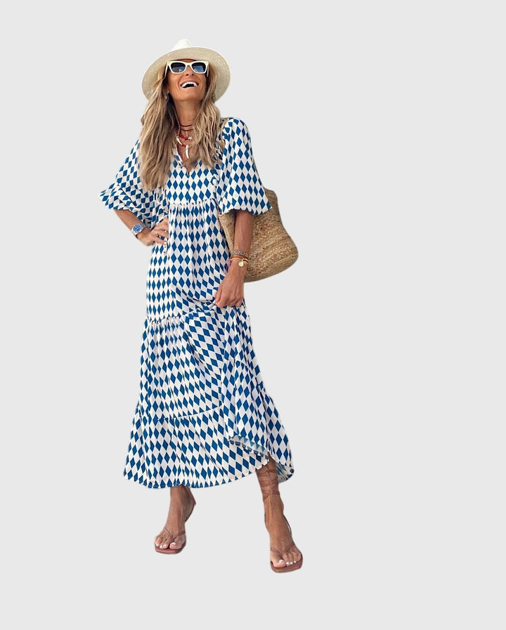 Summer-ready women's flowy Bohemian maxi dress, offering elegant casual chic for holidays and everyday.