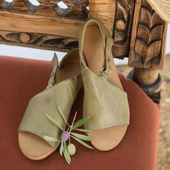 Elegant olive green women's strappy open sandals. Perfect comfortable flat summer footwear for vacations & everyday style.
