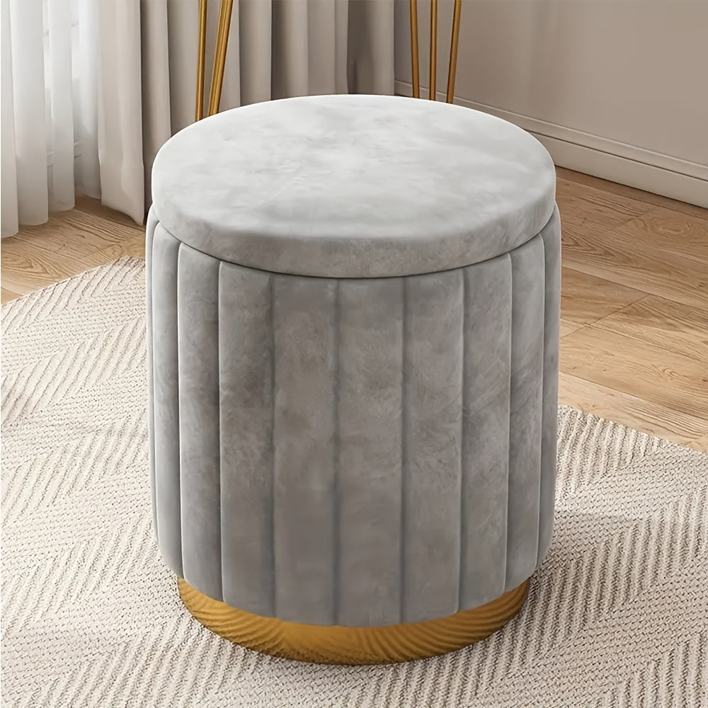 Contemporary round storage ottoman, mirror finish enhances living space.