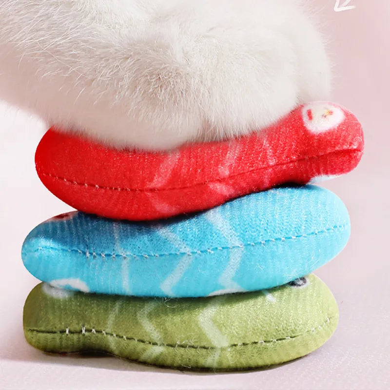 Close-up of a colorful interactive fish cat toy, perfect for chewing, play, and promoting dental health.