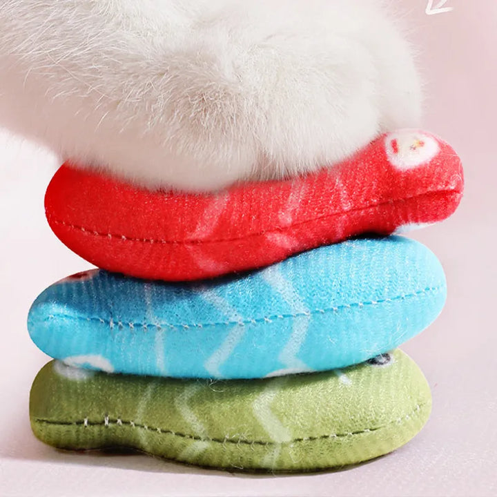 Close-up of a colorful interactive fish cat toy, perfect for chewing, play, and promoting dental health.