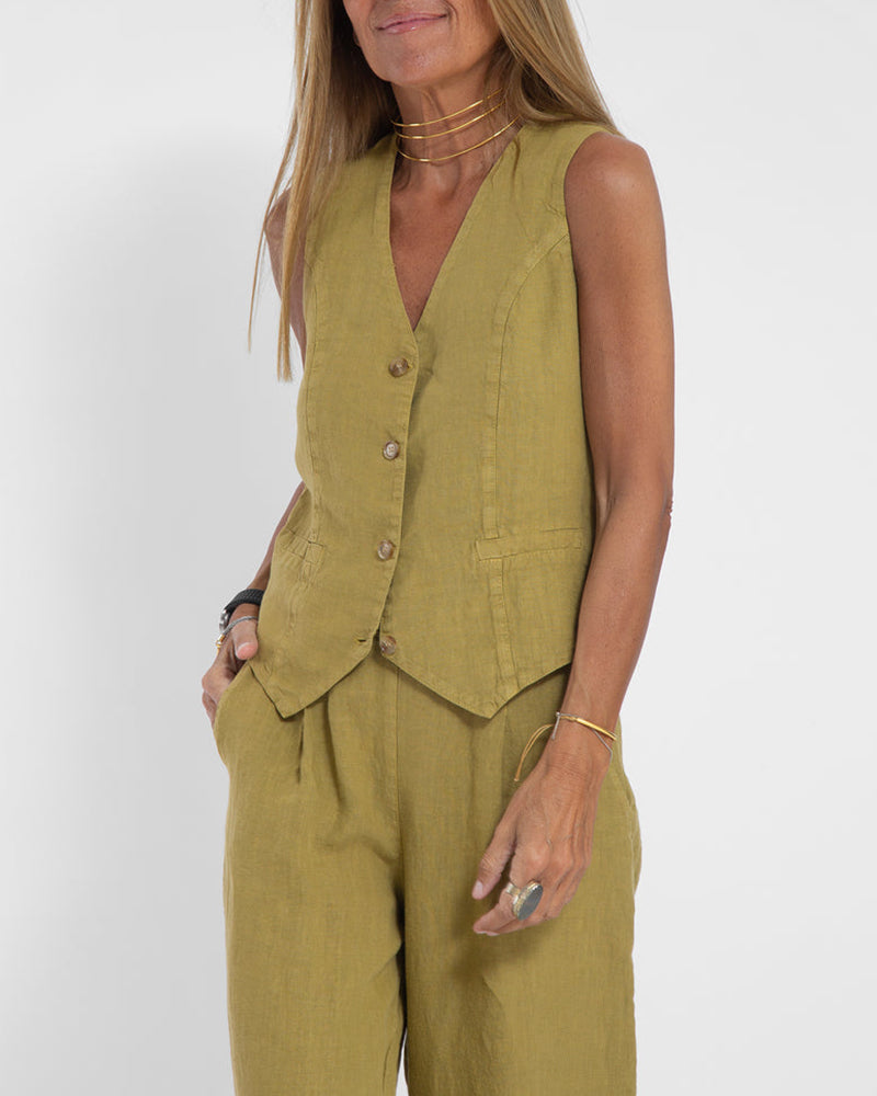 Modern women's two-piece outfit featuring stylish wide leg pants and a matching vest top.