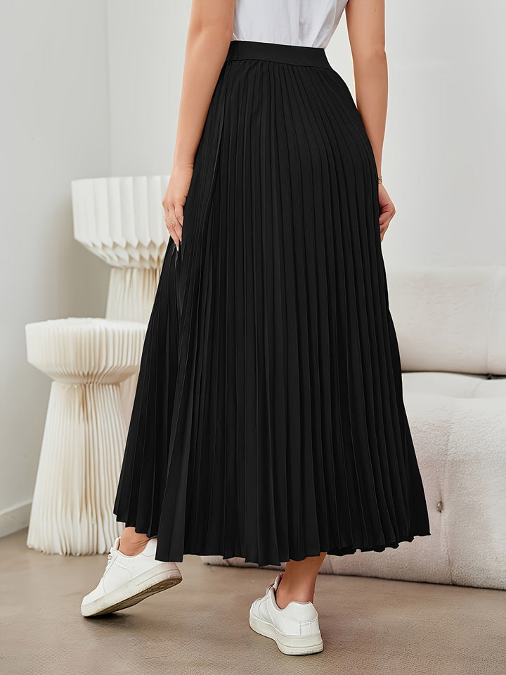 Close-up of elegant pleated midi skirt fabric, showing fine pleats & comfy elastic waist details for women.