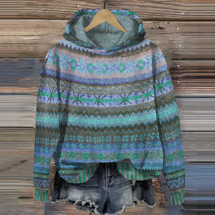 Women's hooded sweatshirt featuring a vibrant 3D Fair Isle print. Comfortable relaxed fit pullover for everyday.