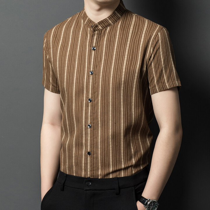 Stylish men's short sleeve vertical stripe button-up shirt. Ideal for casual wear or a smart summer fashion look.