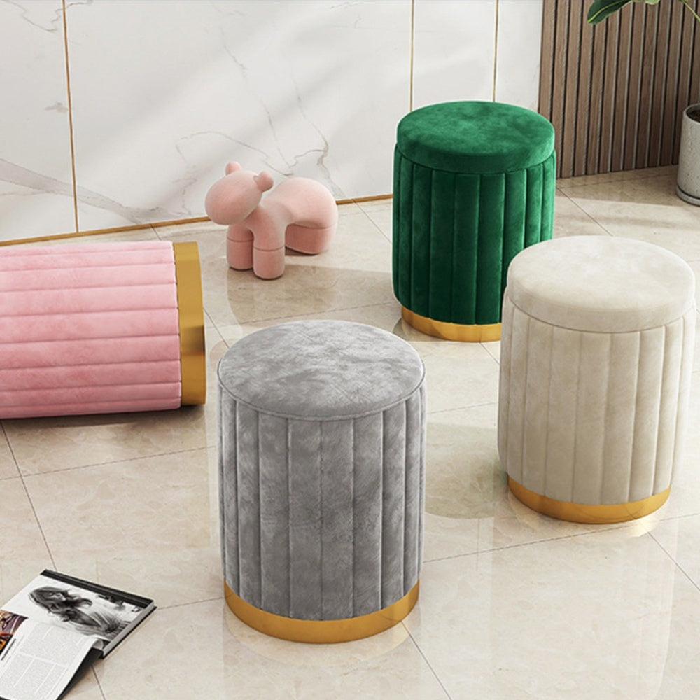 Modern home decor: round storage ottoman with reflective mirror base.