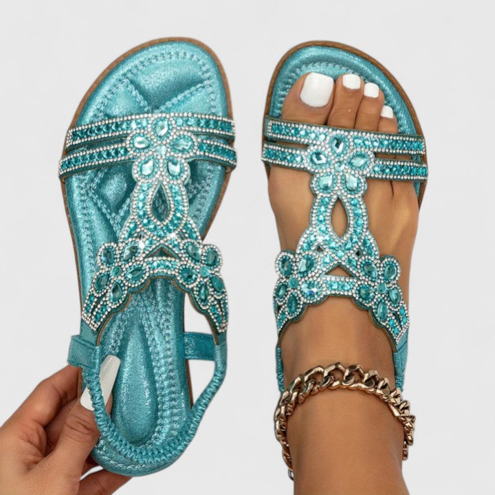 Elegant women's sandals with orthopedic foot support, fashionable bead details, & all-day comfort.