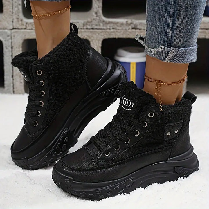 Women's stylish casual snow boots worn outdoors, showcasing their cozy design for warm winter everyday comfort.