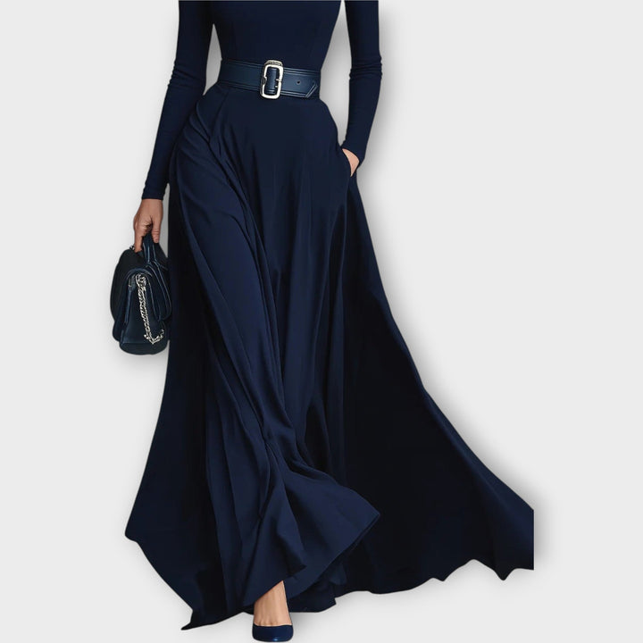 Sophisticated women's high-neck maxi dress with a timeless, elegant design. Perfect flowing long dress for evening wear.