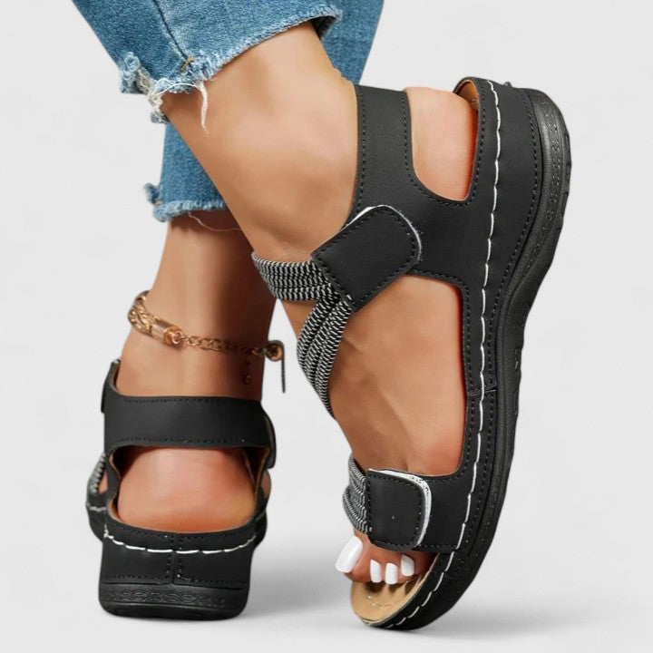 Comfortable women's walking sandals with arch support for stylish, pain-free steps.
