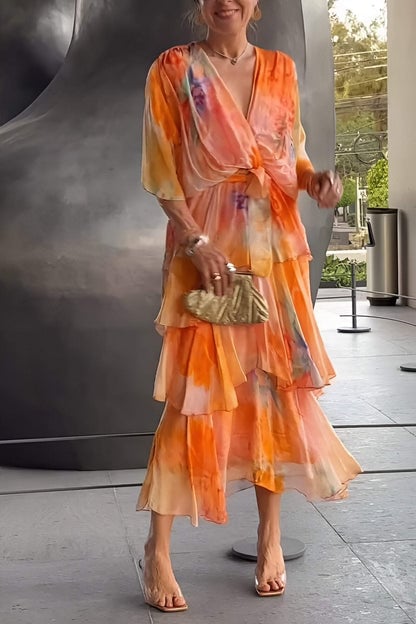 Women's elegant bohemian maxi dress with a flowing layered silhouette. Ideal for vacation, beach, or special occasions.