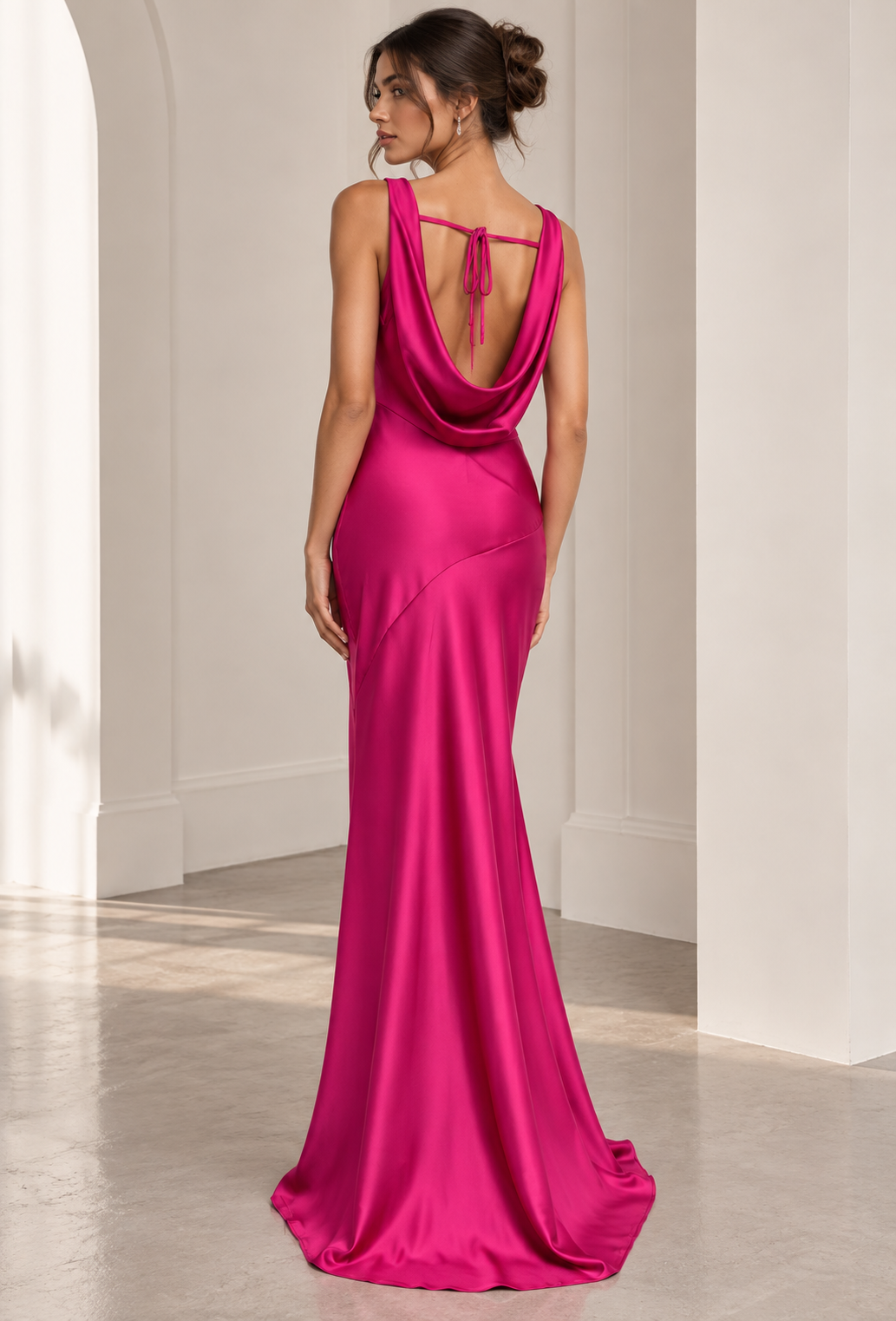 Long fuchsia formal gown for women, featuring a cowl neck. A chic choice for wedding guests & elegant evening parties.