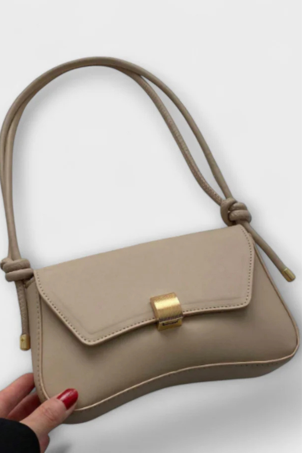 Terracotta minimalist flap shoulder bag for women, featuring a stylish gold clasp & compact design.