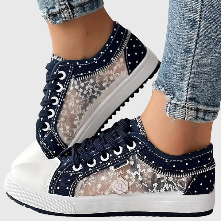 Supportive walking shoes for women with cushioned soles, offering all-day comfort & stability.