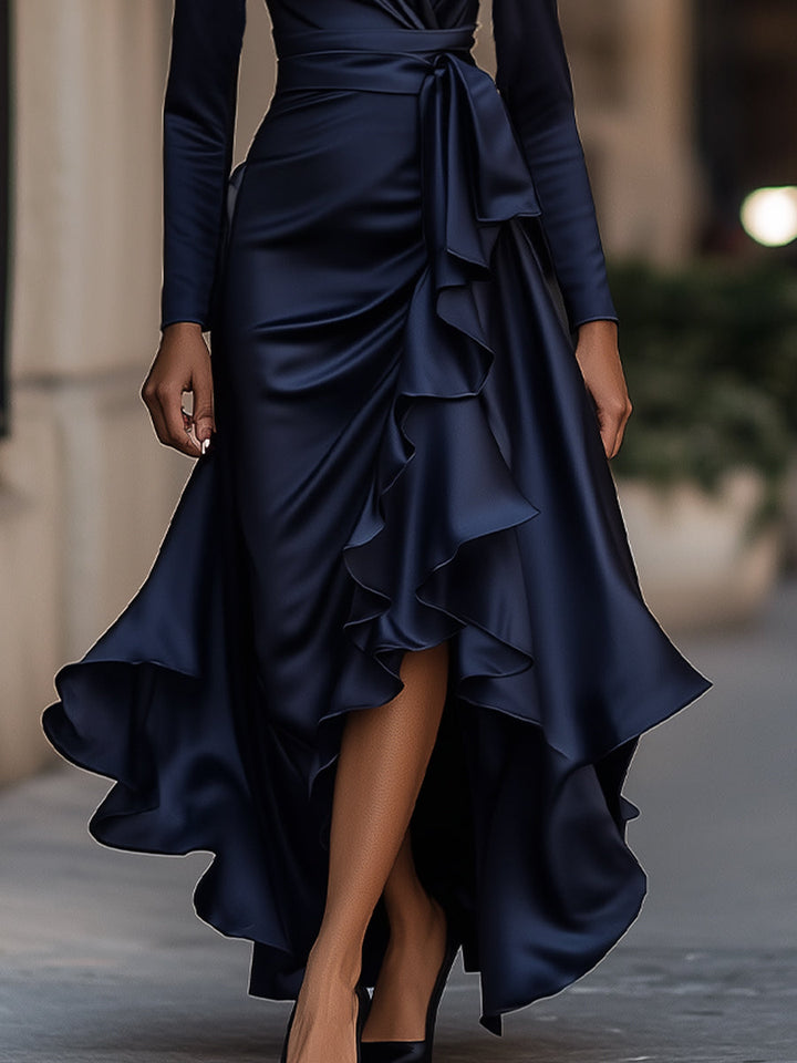 Beautiful women's pleated maxi dress with V-neck and ruffles. Ideal elegant formal wear or party dress.
