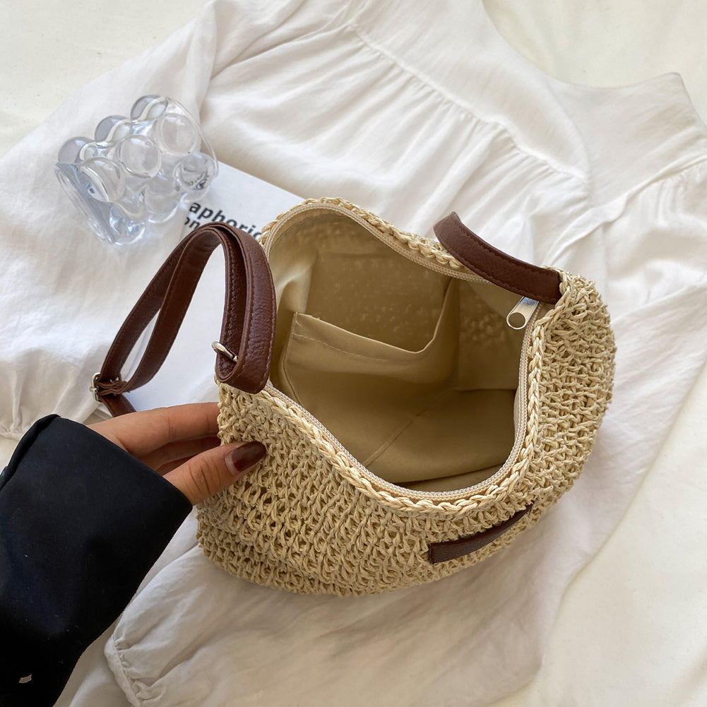Casual yet elegant women's shoulder bag, perfect for everyday errands or a stylish summer look. Practical accessory.