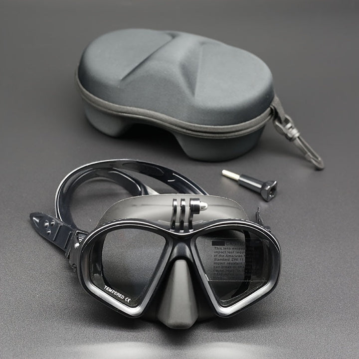 Dive mask with anti-fog tempered goggles, camera mount, and protective storage case for travel.