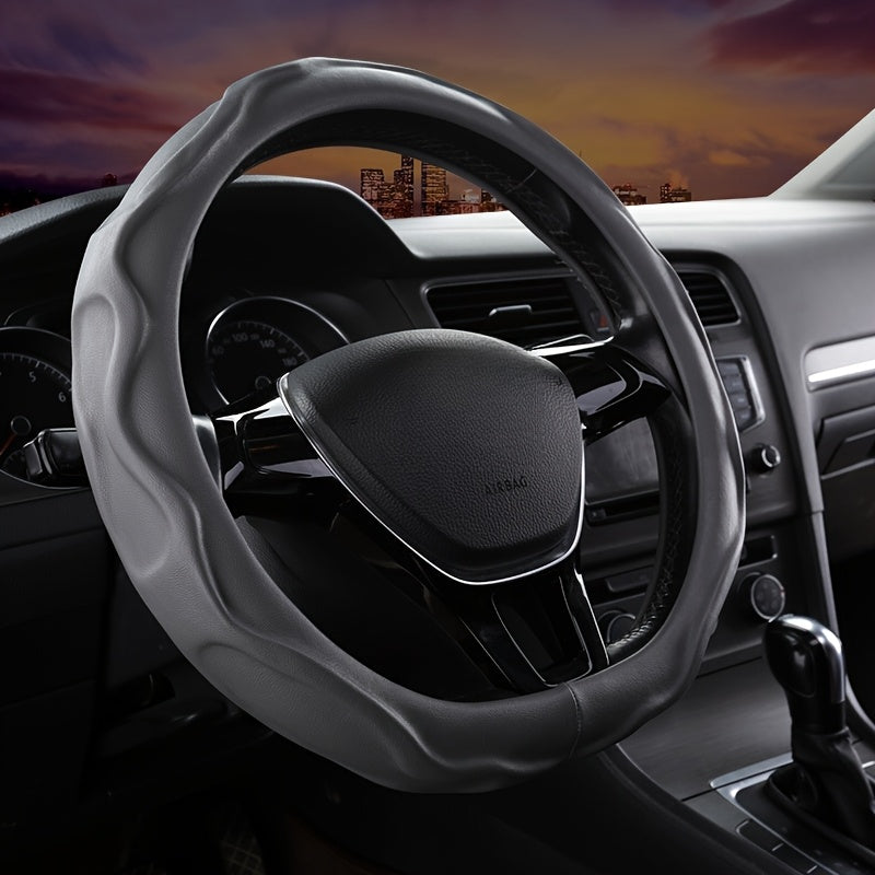 Universal fit non-slip steering wheel cover ensures a firm grip & comfortable driving experience for any vehicle.