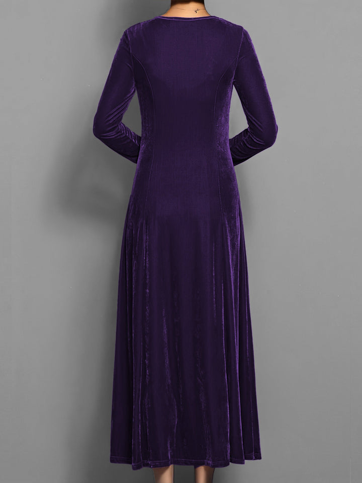 Women's sophisticated long sleeve maxi dress, full-length with a flowing flared skirt, suitable for any occasion.