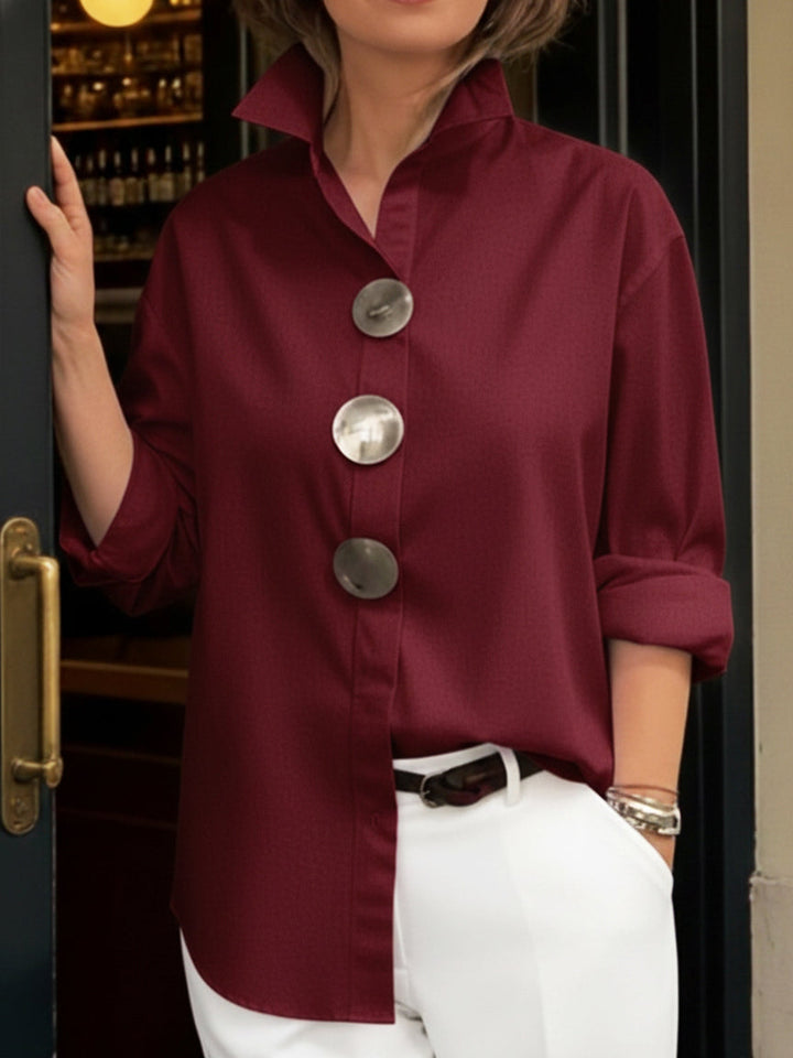 Burgundy women's collared shirt, big button design, offers a relaxed fit & sophisticated style.