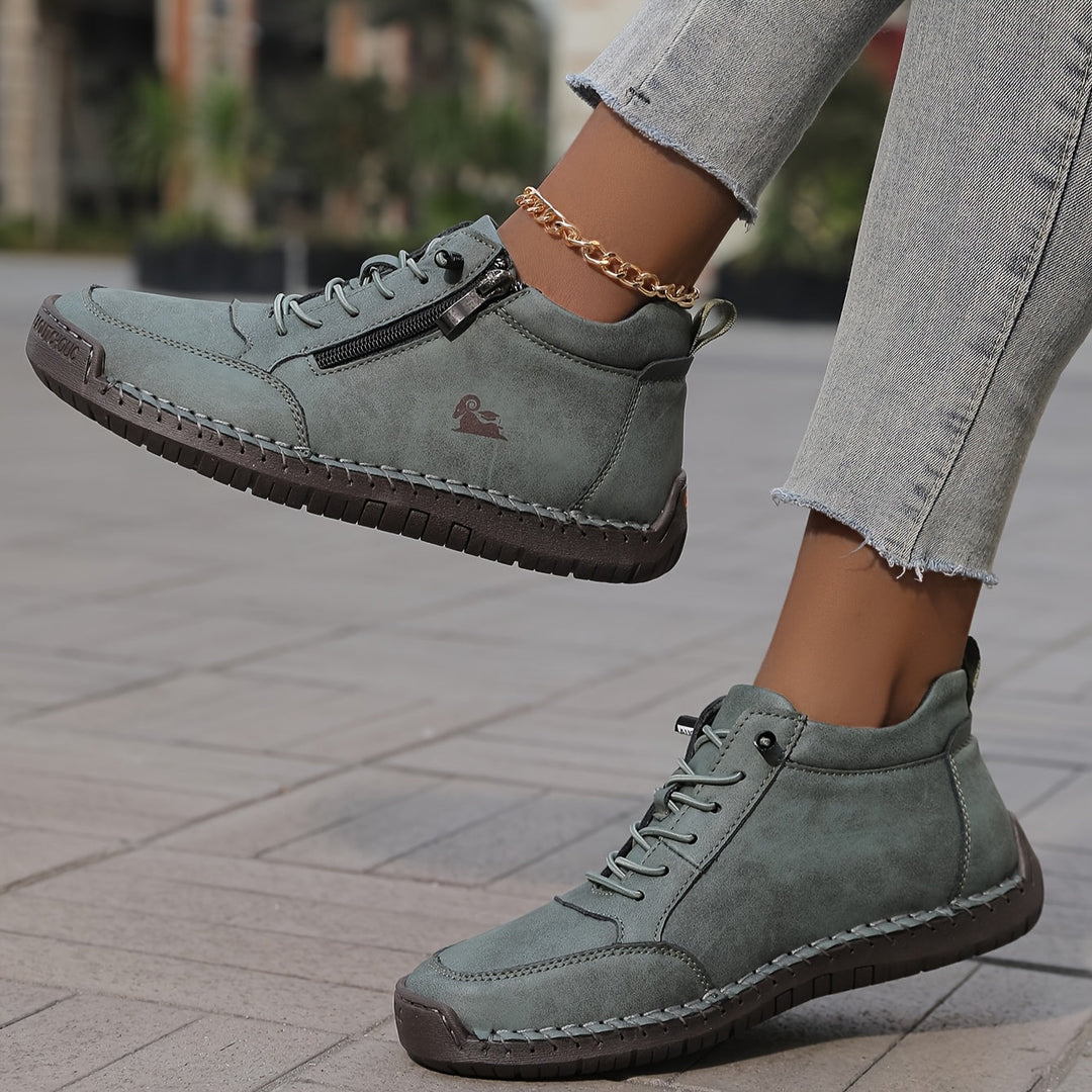 Everyday women's high-top sneakers, featuring a zip and laces for a snug, comfy fit.