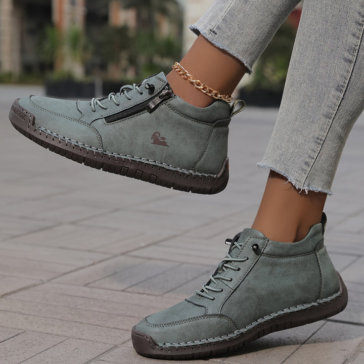 Everyday women's high-top sneakers, featuring a zip and laces for a snug, comfy fit.