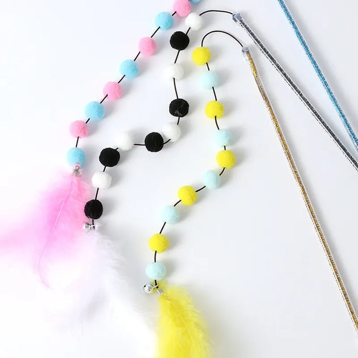 Pompom cat wand toy for interactive pet play, offering a soft, bouncy pompom for endless fun & boredom relief.