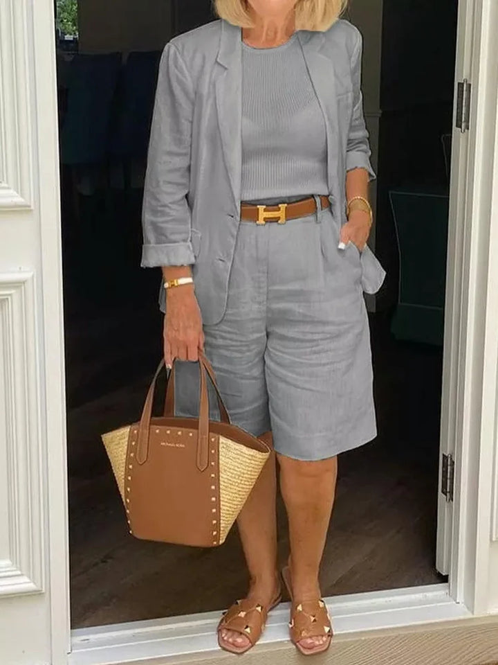 Comfortable women's casual summer set. This trendy two-piece includes a relaxed jacket and breezy shorts.
