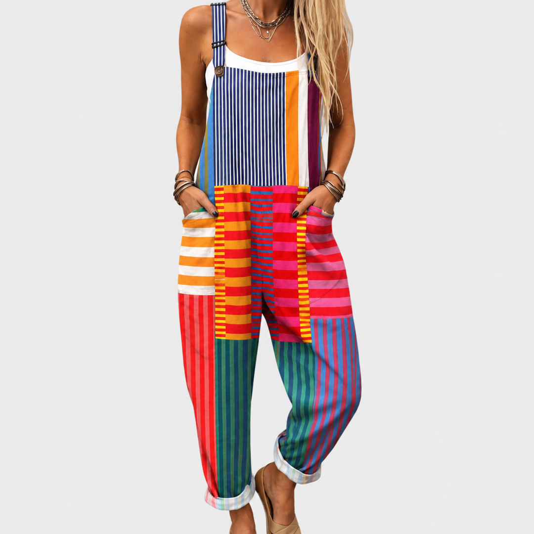 Women's elegant floral printed wide-leg jumpsuit with adjustable straps, perfect for stylish, comfortable summer fashion.