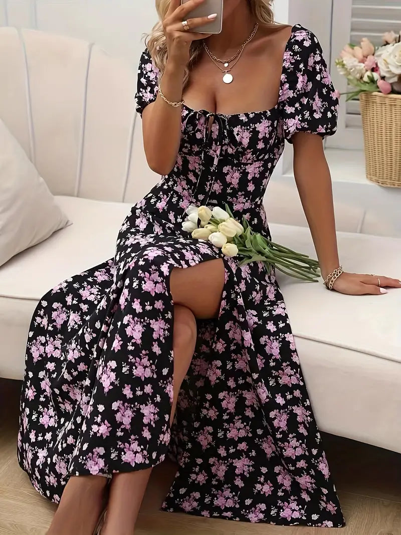 Women's floral A-line midi dress with puff sleeves, a stylish choice for spring and summer.