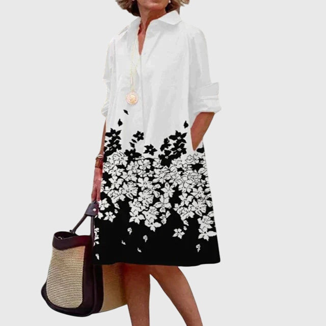 Model enjoying the comfort and chic style of her everyday women's dress with practical pockets.
