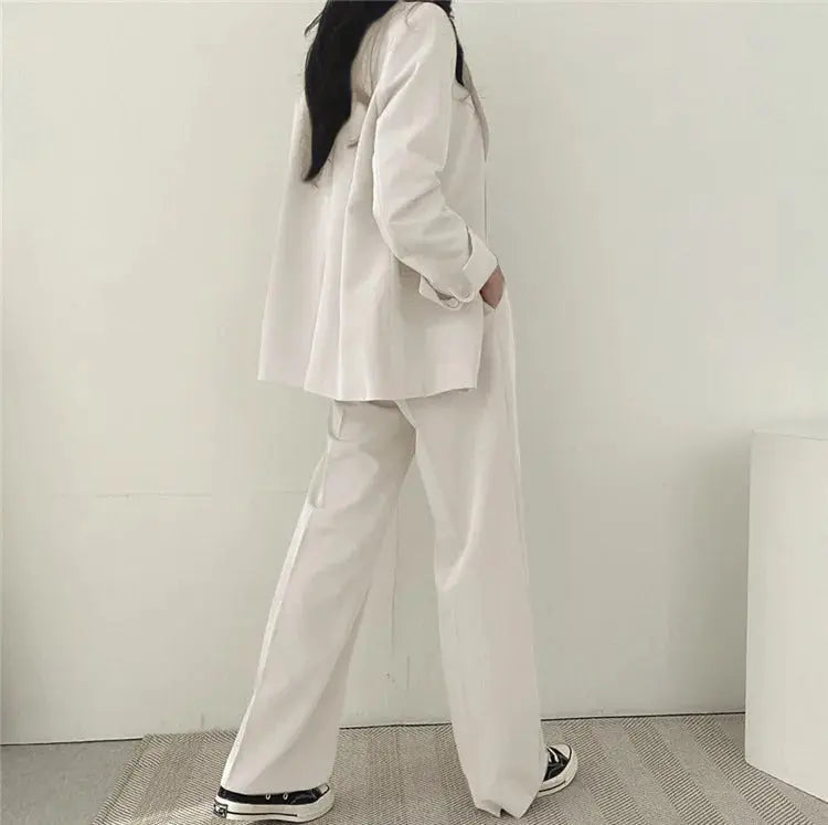 Full length shot of women's elegant tailored suit, perfect for professional settings.