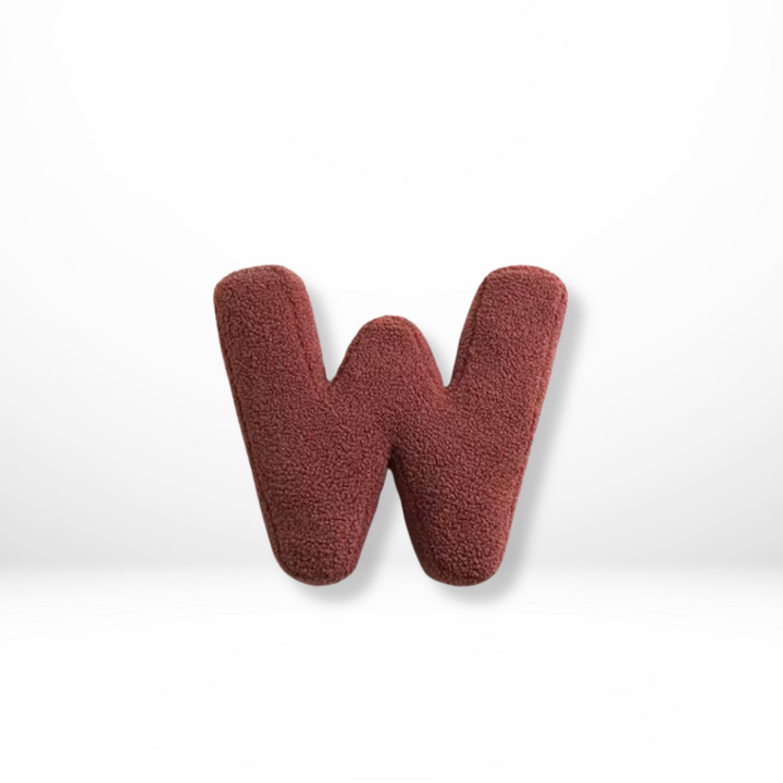 Velvet alphabet cushion, a soft decorative pillow for stylish home accents & personalized decor.