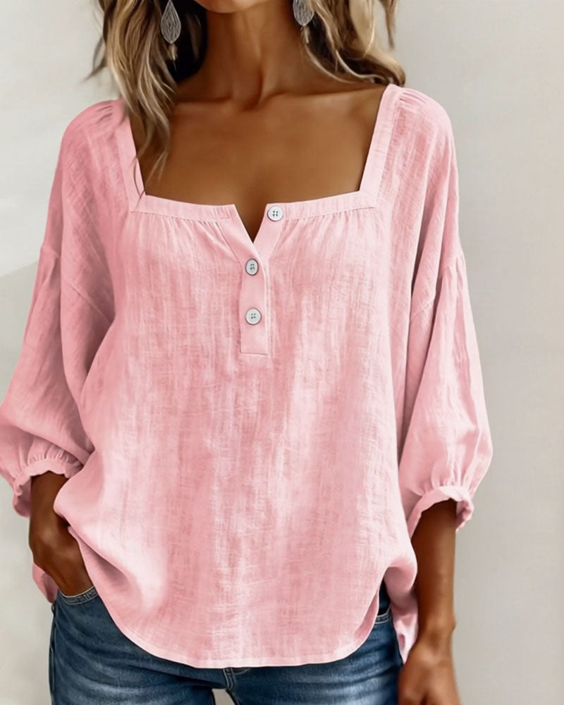 Elegant square neck blouse for women, featuring trendy puff sleeves & relaxed style.