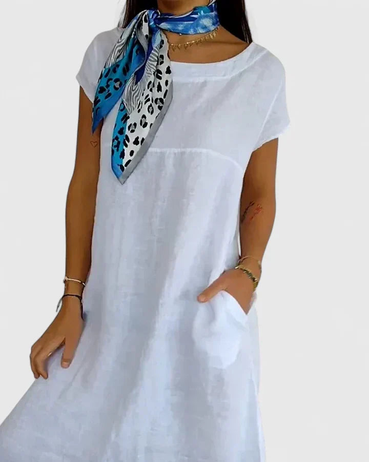 Women's comfortable A-line dress with pockets, perfect for casual or everyday wear.
