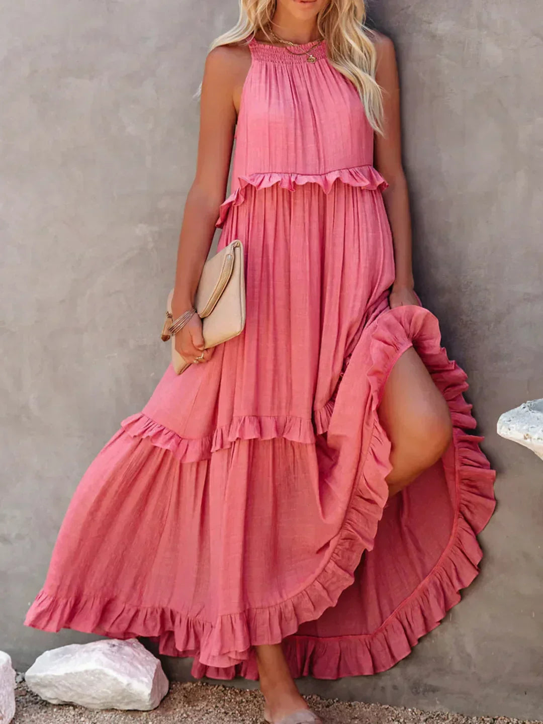 Effortlessly chic white halterneck ruffle maxi dress with pockets, holiday vibes.
