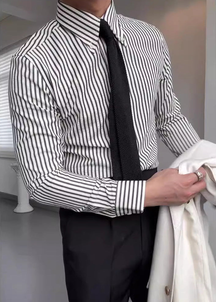 Modern men's striped button-down shirt. Long sleeve casual top in breathable fabric, ideal for stylish everyday men's clothing.