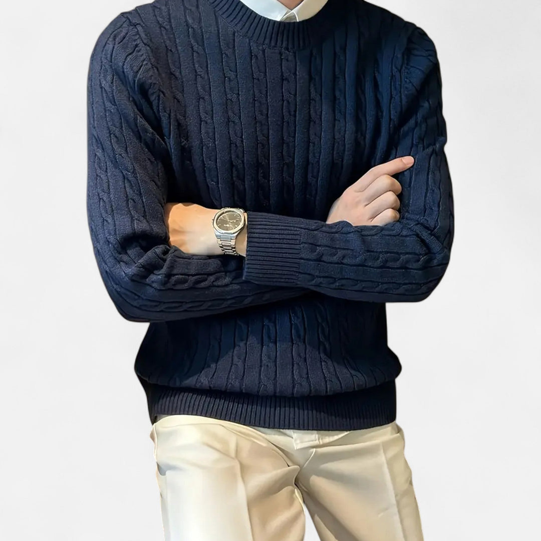 Close-up of a men's ribbed knit sweater, crew neck design, showcasing soft texture and quality.
