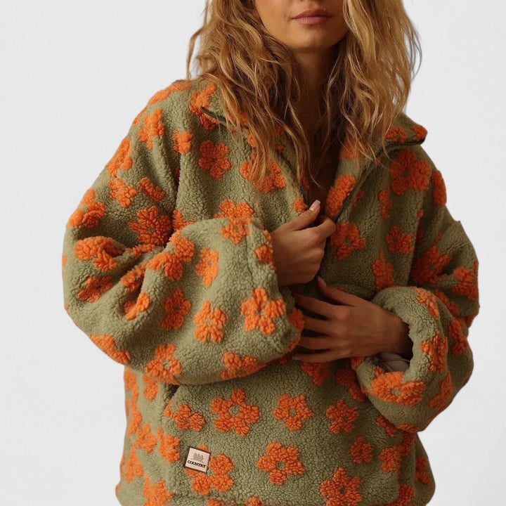 Chic women's half-zip floral jumper, a comfortable long-sleeve sweater perfect for sophisticated fall/spring style.