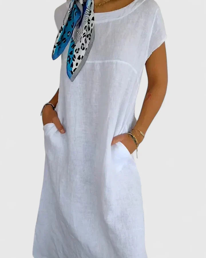 Chic A-line summer dress for women, featuring convenient pockets and an elegant, versatile design.