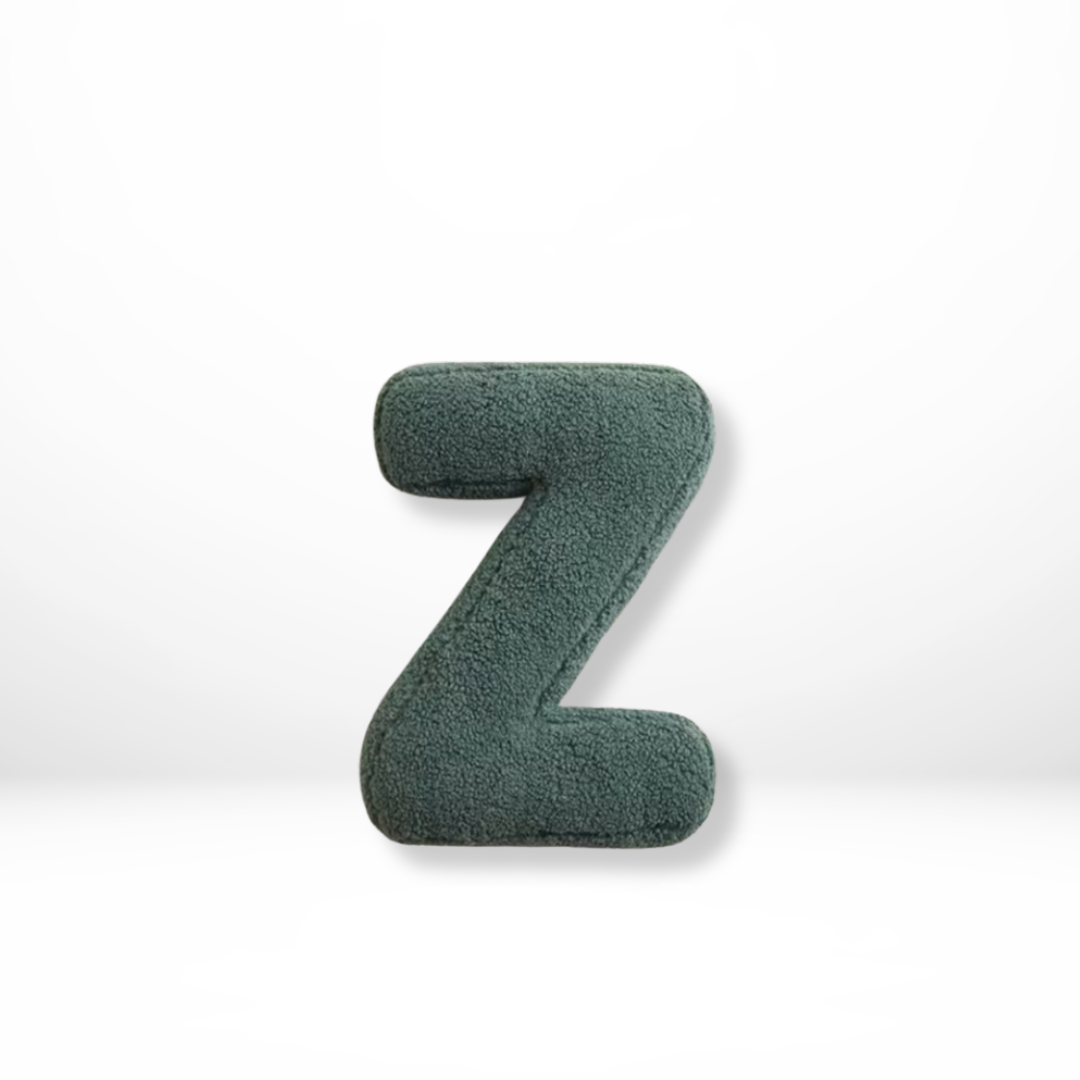 Elegant velvet letter pillow, bringing a personalized touch & sophistication to home accents.