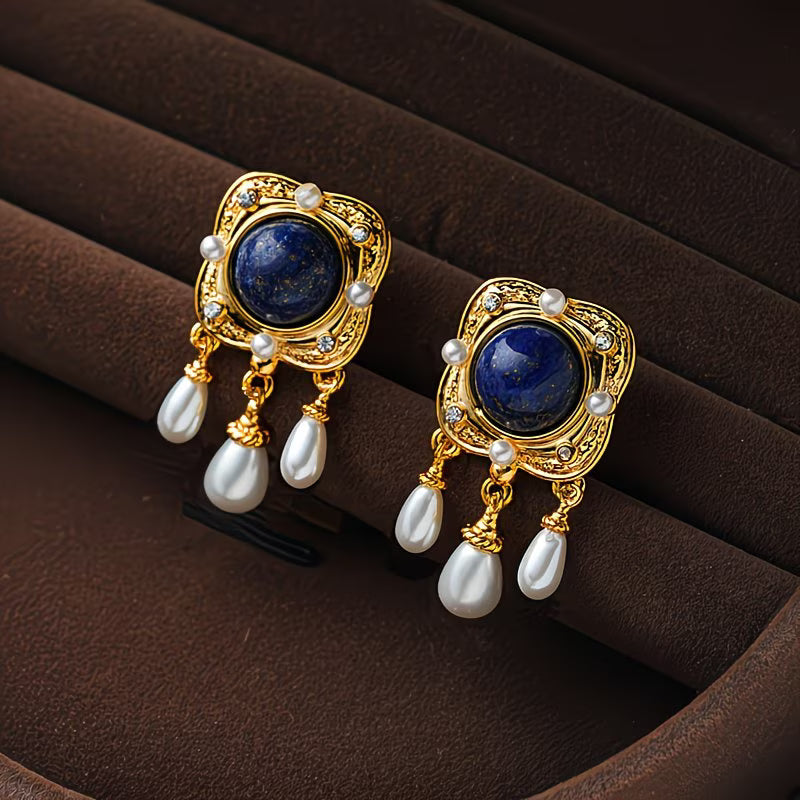 Elegant women's royal blue pearl chandelier earrings, perfect for special occasions. Hypoallergenic drop design.