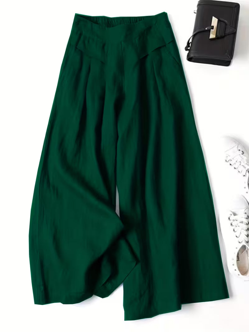 Stylish women's high-waist palazzo trousers. Loose, breathable fabric for spring/summer effortless comfort.