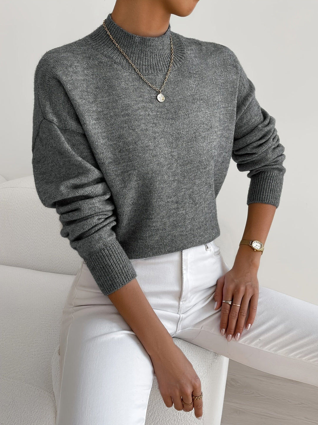 Elegant women's long sleeve knitted top, perfect for casual chic outfits.